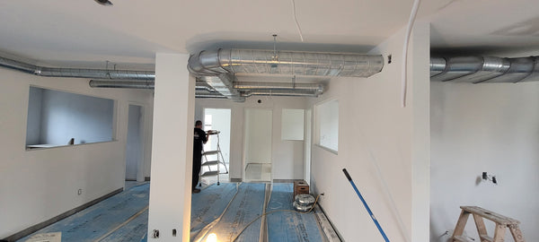 Système central pour bas plafond bâtisse commerciale